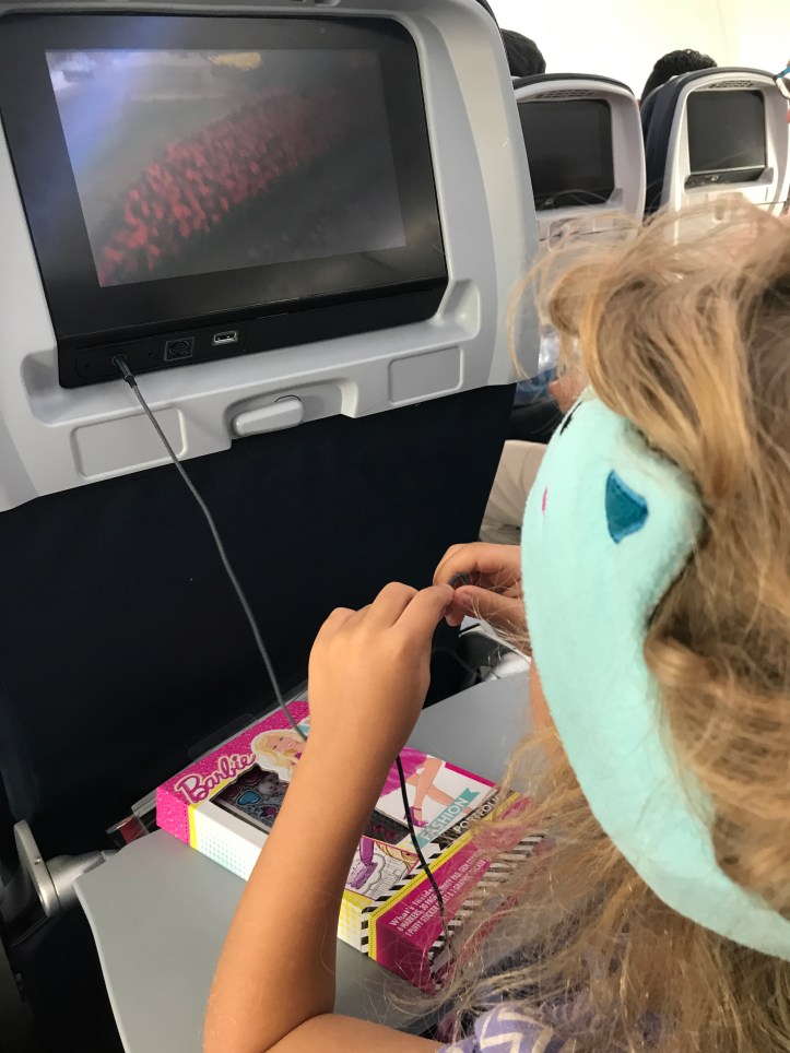 Guide to Surviving Long Haul Flights with Little Kids: Part 3-On the Plane | www.carriereedtravels.com
